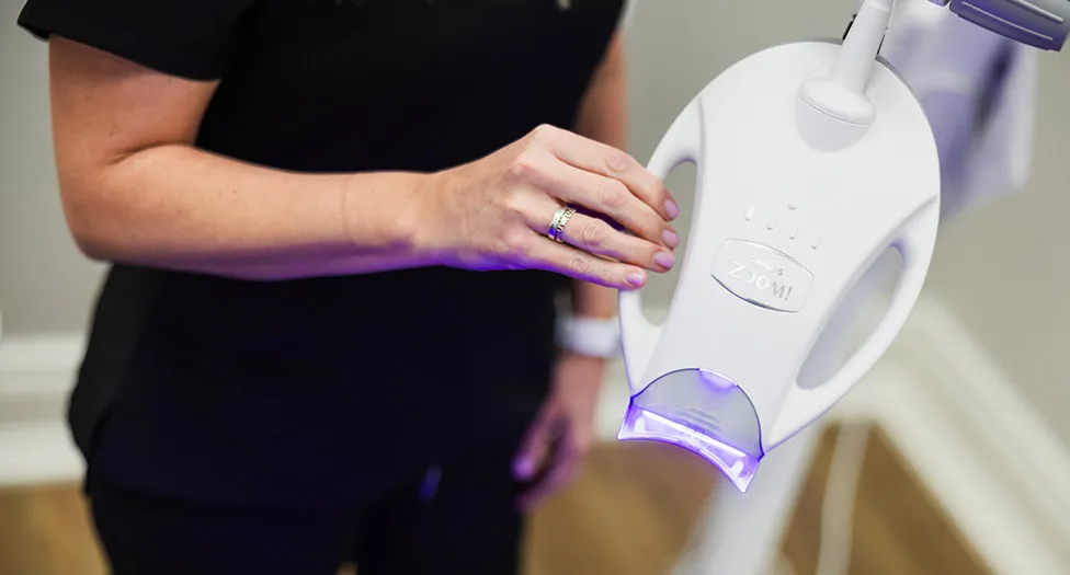 Woman undergoing teeth whitening